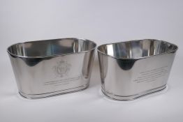 A pair of plated metal Champagne coolers, engraved with aphorisms from Lily Bollinger and Napoleon