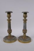 A pair of brass candlesticks with machined decoration, 25cm high