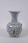 A Chinese blue and white porcelain vase with decorative floral panels, Xuande 6 character mark to