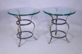 A pair of Maison Jansen style wrought steel occasional tables with brass mounts, goat's mask