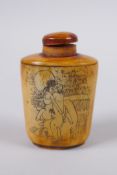 A Chinese bone snuff bottle decorated with erotic scenes, 6cm high