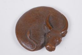 A Japanese style bronze buffalo paper weight, 10 x 9cm