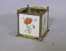 A brass planter, the side inset with Minton tiles decorated with wild flora and fauna, 20 x 20 x