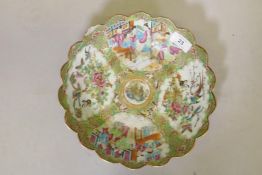 A C19th Cantonese famille verte bowl with shaped rim, AF, 26cm diameter