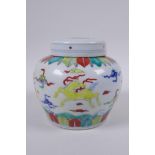A Chinese Doucai porcelain ginger jar and cover, decorated with mythical creatures, mark to base,