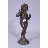 A cast iron figure of a putto, 53cm high
