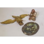 An antique carved and giltwood bird, AF, 25cm high, a painted and giltwood Buddha, and a stained