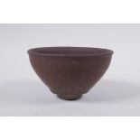 A Chinese Jian ware rice bowl, two character mark to base, 13cm diameter