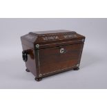 A Victorian rosewood sarcophagus shaped tea caddy with silver and mother of pearl inlaid decoration,