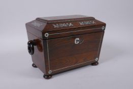 A Victorian rosewood sarcophagus shaped tea caddy with silver and mother of pearl inlaid decoration,