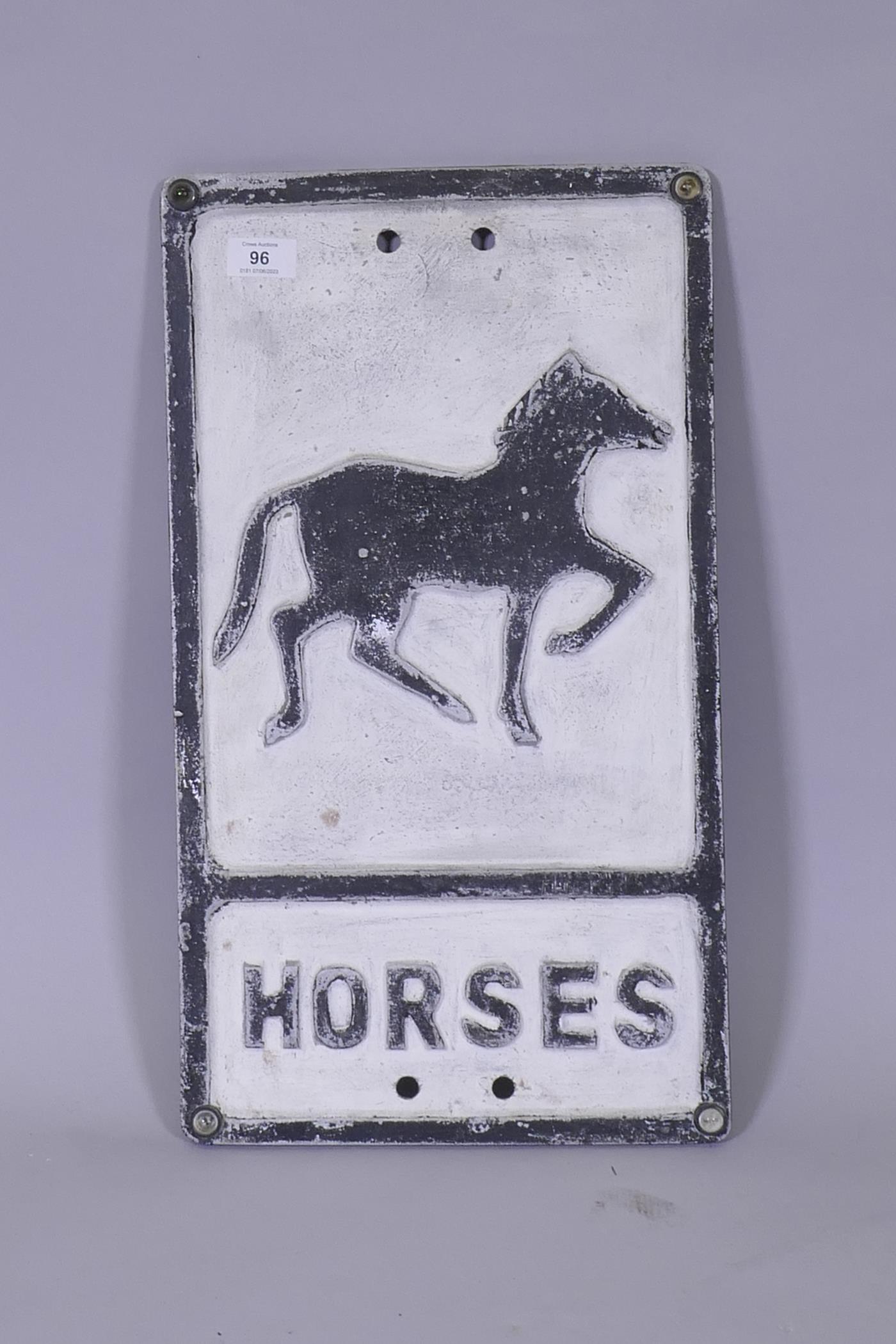 A vintage cast aluminium Horses warning sign, with glass reflectors, 53 x 30cm