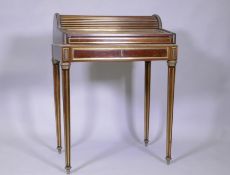 A French mahogany bonne heure du jour, with brass mounts, the pull out drawer operating the