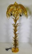 A gilt metal floor lamp in the form of a palm tree, 160cm high