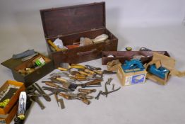 A quantity of vintage hand tools, a Stanley No 4 plane, unused, Black and Decker saw etc