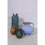 A studio pottery pot with two handles and blue glaze, 23cm high, a green glazed pot, terracotta