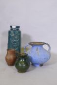 A studio pottery pot with two handles and blue glaze, 23cm high, a green glazed pot, terracotta