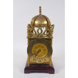 A brass cased lantern clock, 32cm high