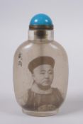 A Chinese reverse decorated glass snuff bottle with a portrait of an emperor, character