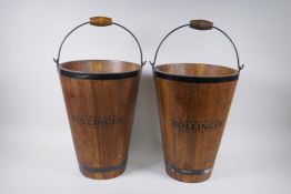 A pair of coopered wooden champagne buckets with Bollinger decoration, 40cm high, 30cm diameter