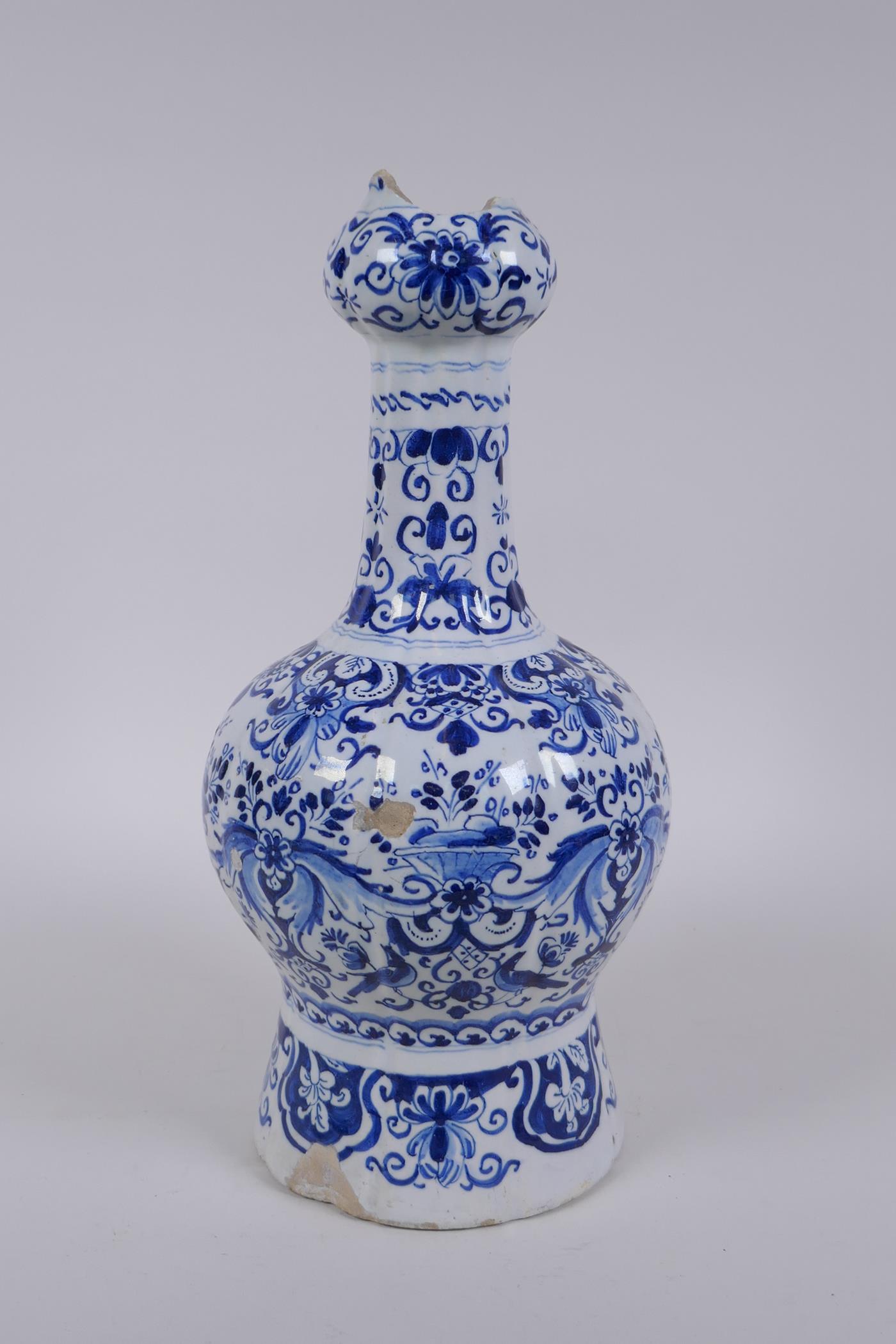 An C18th/C19th Delft blue and white garlic head shaped vase, decorated with birds, flowers and - Image 2 of 7