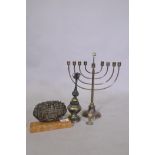 Judaica, a silver plated menorah, a silver ornament depicting Jerusalem, on a marble mount, a silver
