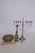 Judaica, a silver plated menorah, a silver ornament depicting Jerusalem, on a marble mount, a silver