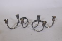 A pair of mid century Carl Christiansen Danish silver plated candle holders, 6cm high