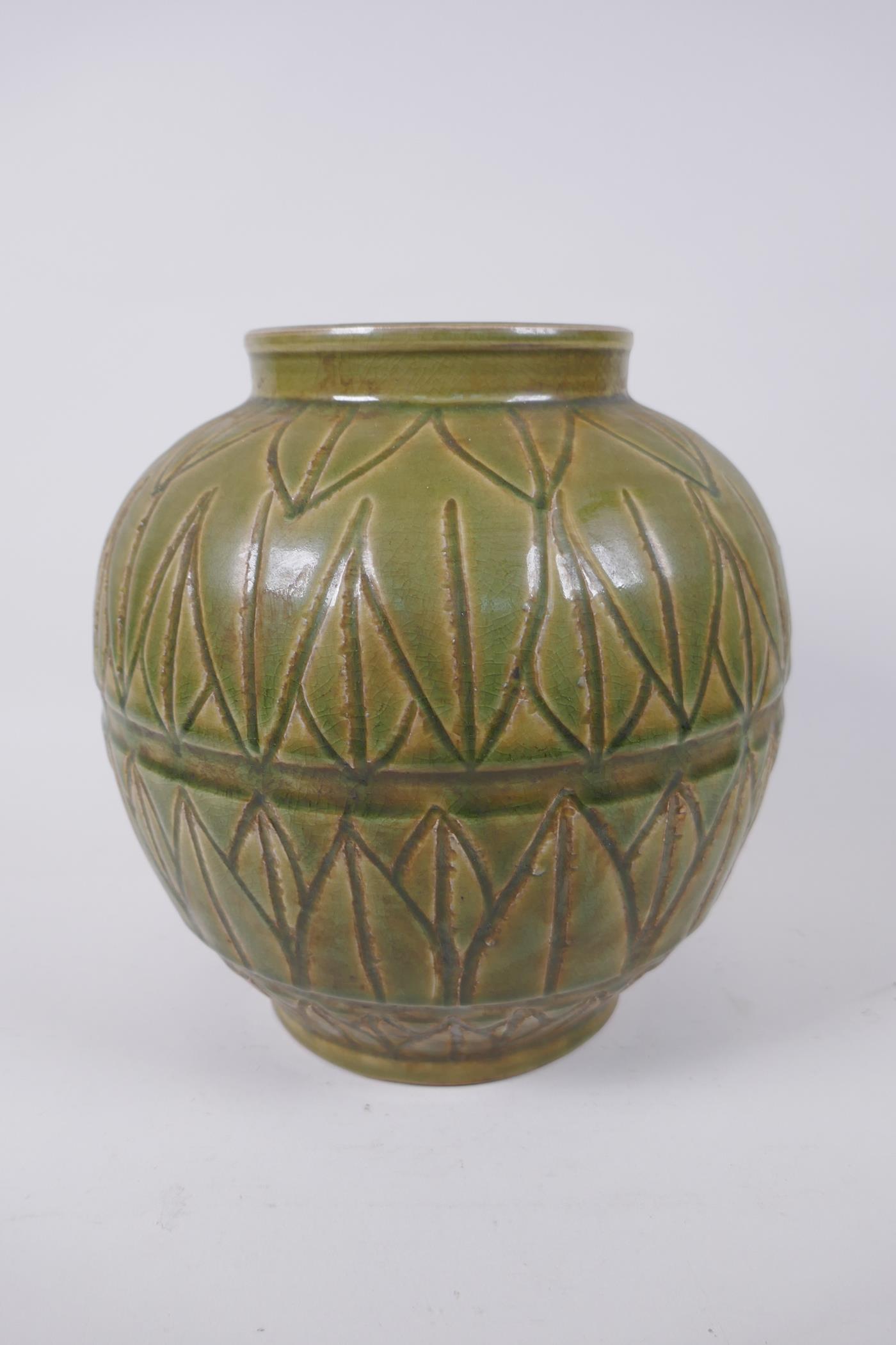 An oriental olive glazed porcelain jar with incised lotus leaf decoration, 23cm high - Image 2 of 4