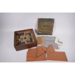 An early C20th box of Lott's stone building bricks, Set 3, original in box, 26 x 26cm