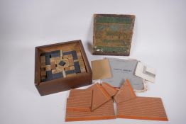 An early C20th box of Lott's stone building bricks, Set 3, original in box, 26 x 26cm
