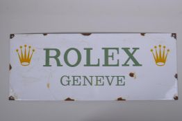 A vintage style 'Rolex Geneve' enamel advertising sign, 58 x 23cm