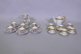 A Bohemian porcelain six place tea set with raised gilt borders, unused, and another with floral