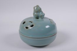 A Chinese Ru ware style porcelain censer and pierced cover, the cover with Fo dog knop, 13cm