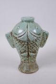 A Chinese celadon glazed porcelain carp vase, 22cm high