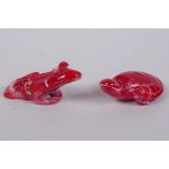 An oriental carved coral toad, and another4 carved in the form of a tortoise, 6cm long