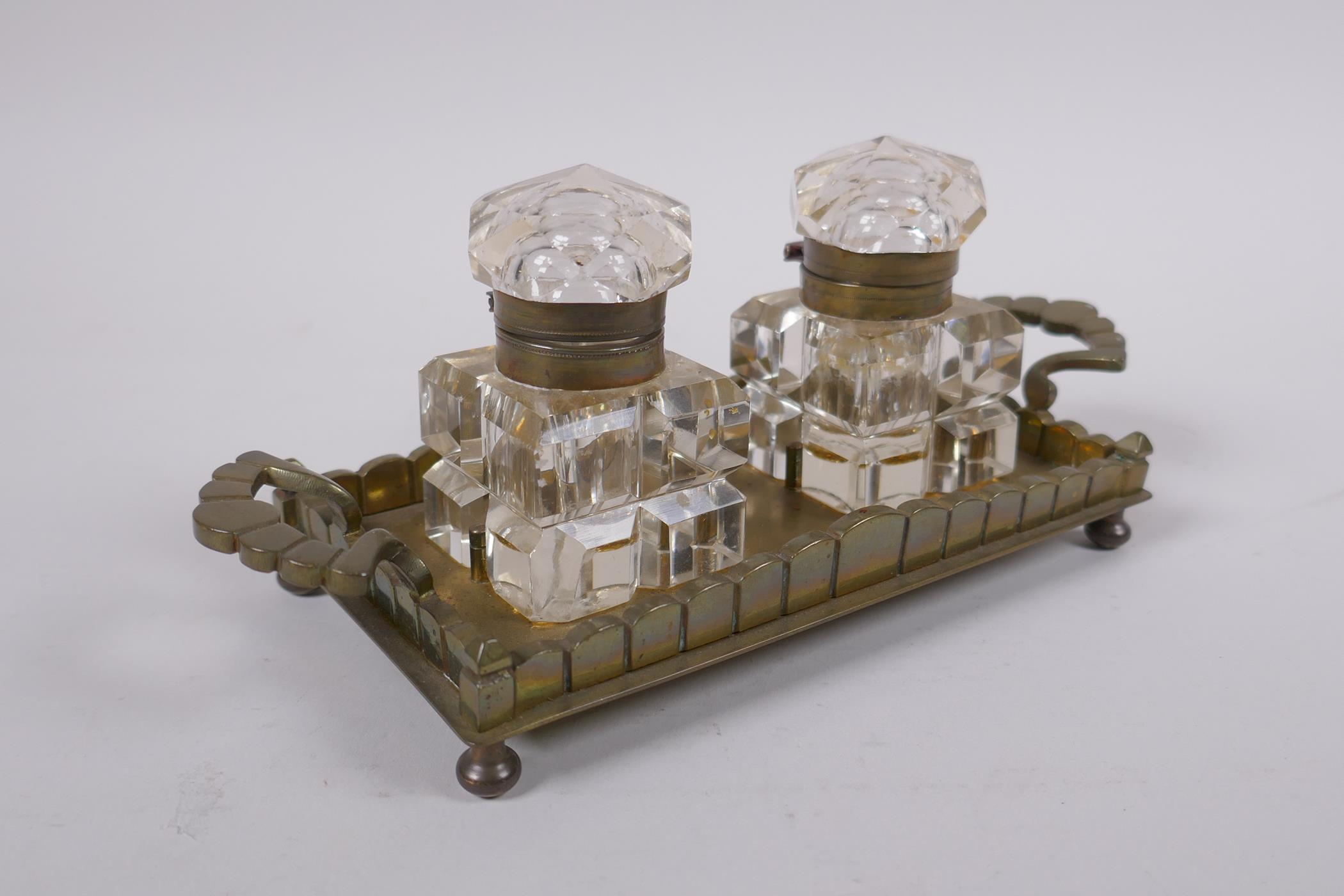 An antique brass and glass twin inkwell desk stand, 21 x 9cm - Image 2 of 3