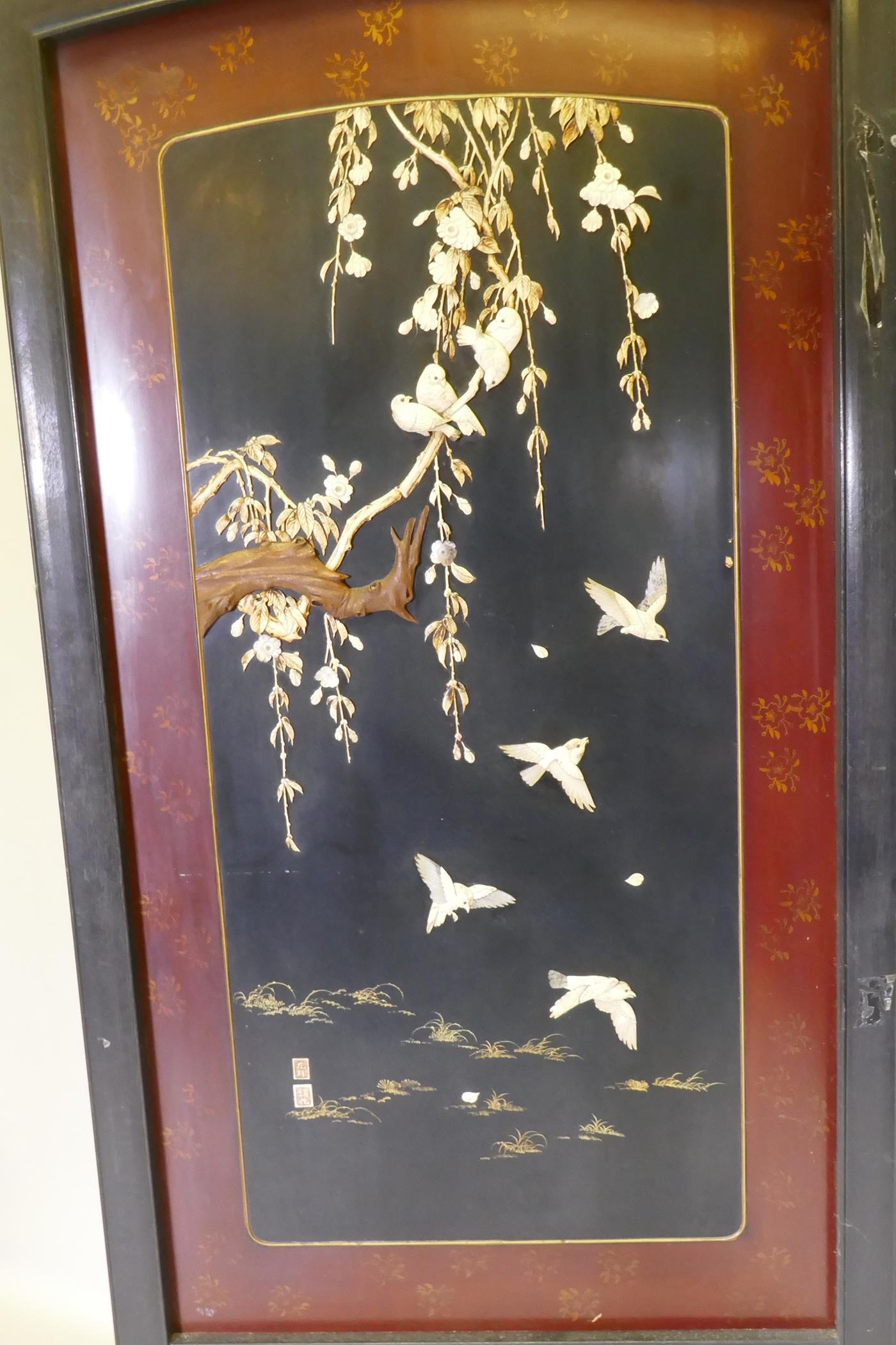 A Meiji period two fold lacquer screen, with raised decoration of birds and blossom in bone, - Image 2 of 5
