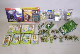 A collection of Mirage Studios Teenage Mutant Ninja Turtles toys, five issues of The Star Wars