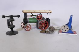 A Mamod steam traction engine, a model fly press, hammer etc