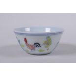 A Doucai porcelain tea bowl with chicken decoration, Chinese Chenghua 6 character mark to base,