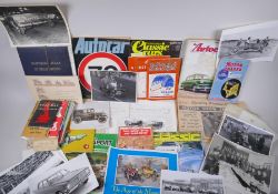 A collection of vintage motoring ephemera to include official car press photographs, automotive