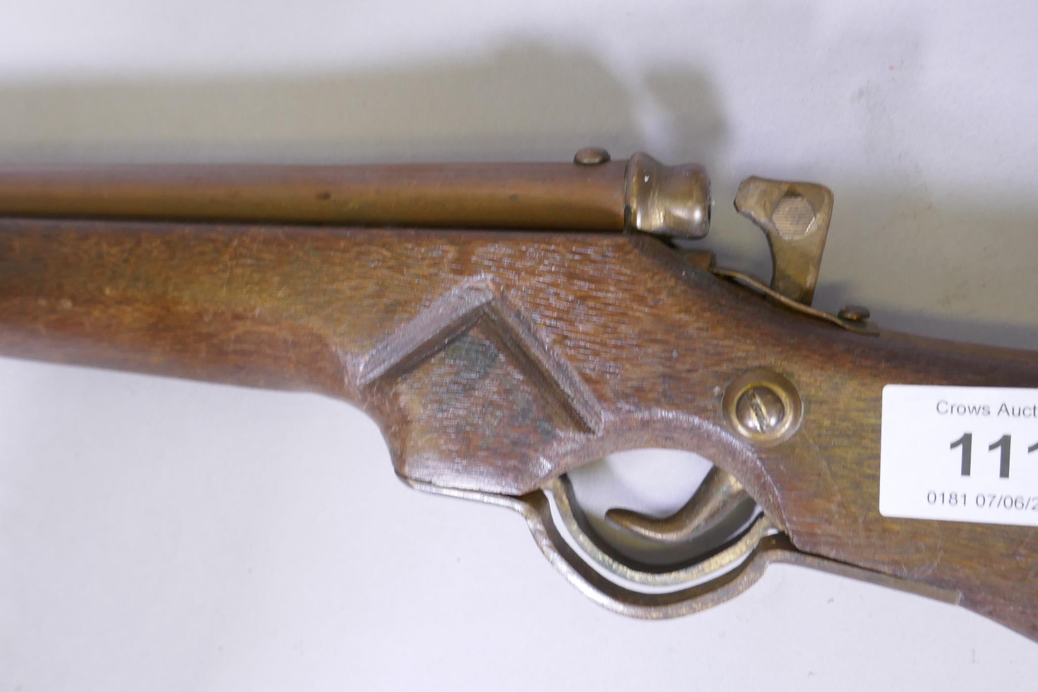 A child's toy rifle, 74cm long - Image 2 of 3