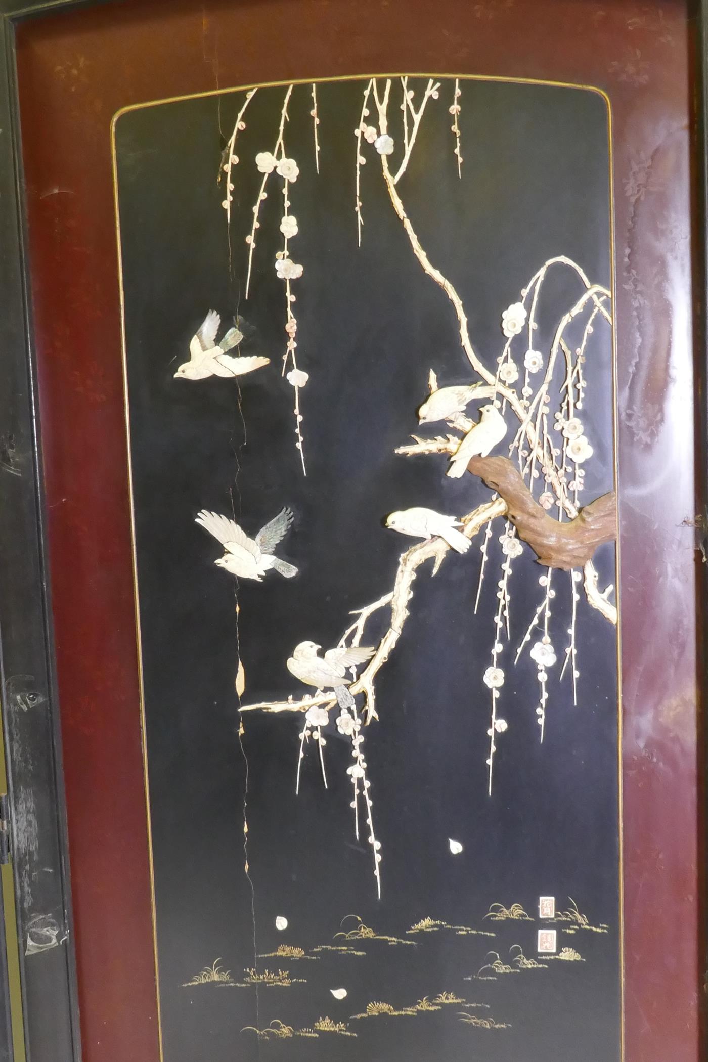 A Meiji period two fold lacquer screen, with raised decoration of birds and blossom in bone, - Image 3 of 5