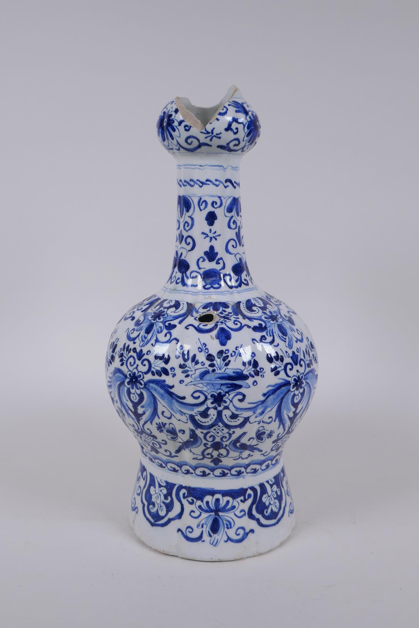 An C18th/C19th Delft blue and white garlic head shaped vase, decorated with birds, flowers and - Image 4 of 7