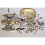 Quantity of silver plated ware, including a wine funnel, corkscrews, and bottle stoppers and