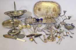 Quantity of silver plated ware, including a wine funnel, corkscrews, and bottle stoppers and