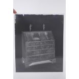 A collection of eight early to mid century glass plate negative photographs of antiques, possibly by