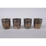 A set of four antique French silver shot beakers, 4cm high, 32g