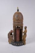 An Austrian style cold painted bronze figure of an Arabic tower, with concealed female nude and