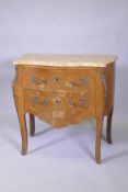 A continental inlaid tulipwood commode with marble top, drawers and serpentine front, raised on